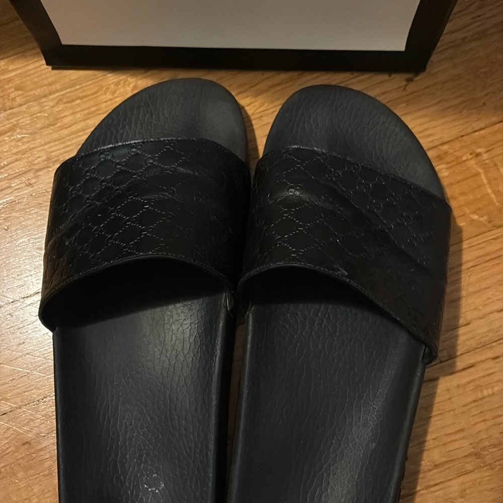 Black Gucci slides